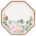 Octagon-shaped paper plate with a cream background bordered by tan, featuring a watercolor floral arrangement of pink and peach roses with green and brown leaves and foliage at the bottom.