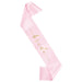 Pink sash with scalloped edges and gold script text reading "Bride" displayed diagonally against a white background.