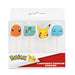 Set of four Pokemon character birthday candles featuring Charmander, Bulbasaur, Pikachu, and Squirtle faces on wooden sticks in original packaging.