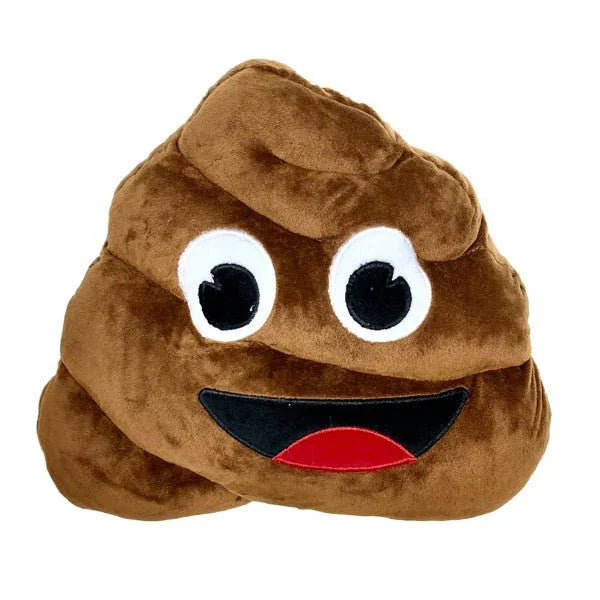 Brown plush pillow shaped like a smiling poop emoji with large white eyes, black pupils, and a wide grinning mouth with a black upper lip and red lower lip.