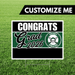 Customizable yard sign with white border featuring "CONGRATS Grad 2026" text in green and white with Poteet Pirates logo on grass background.