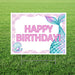 Mermaid-themed yard sign with pink "Happy Birthday" text, turquoise mermaid tail, seashell, and scalloped border on white background, mounted on metal stakes in grass.