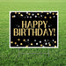 Black yard sign with white border featuring large gold "HAPPY BIRTHDAY!" text centered, decorated with gold, silver, and white circles and sparkles around the edges.