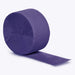 Roll of purple crepe paper streamer partially unrolled against a white background.