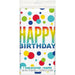 Colorful plastic tablecover with "Happy Birthday" text in rainbow gradient letters and scattered polka dots in red, yellow, green, blue, and teal throughout the white background.