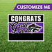 Graduation-themed sign with 'Congrats Grad 2026' on a grass background