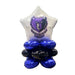 Silver star-shaped foil balloon with purple bear mascot logo and "Rocky Mountain Grizzlies" text, supported by blue and black air-filled balloon clusters at the base.