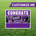 Graduation-themed sign with 'Congrats Grad 2026' on a grass background