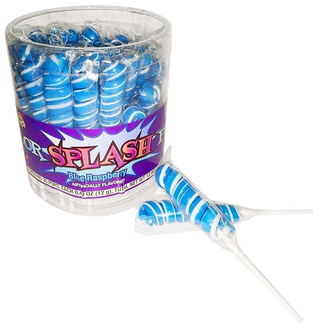 Clear plastic container holding approximately 30 blue and white swirled lollipops with a purple label reading "Color Splash Blue Raspberry," with one lollipop displayed separately in front.