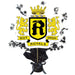 Black star-shaped sprays emerge from a yellow and black Roy High Royals school crest centerpiece with crown, lions, and banner ribbons in a black vase with bow.
