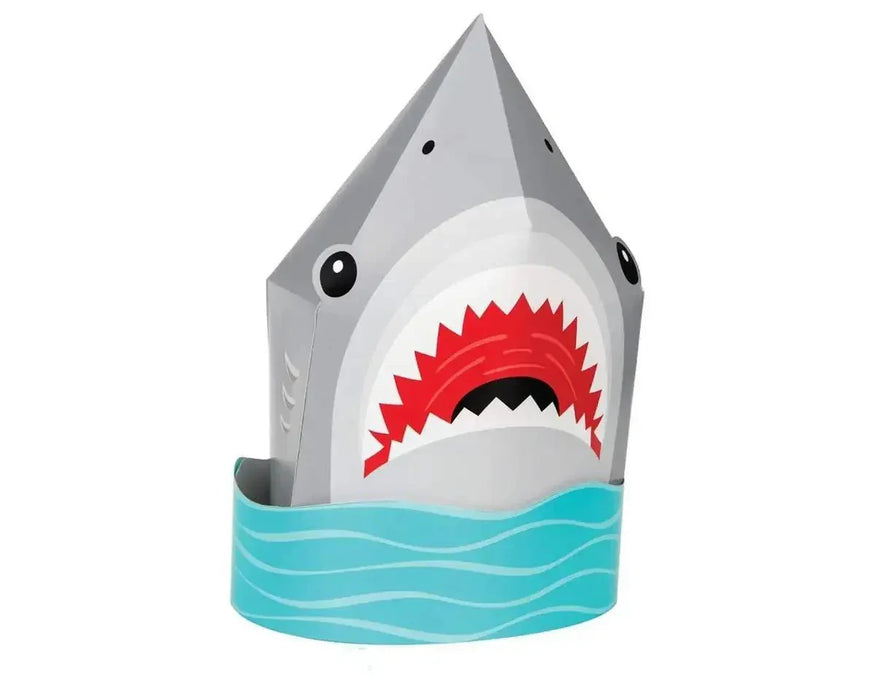 Gray shark-shaped party centerpiece with red gums and white teeth, black eyes, and a turquoise wave-patterned base.