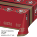 Red plastic tablecloth with San Francisco 49ers logos and text, measuring 102 inches long by 54 inches wide with gold trim.