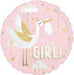 Pink round mylar balloon featuring a white stork with gold wings carrying a baby bundle, surrounded by gold stars and clouds, with "It's a girl" text in white and gold lettering.