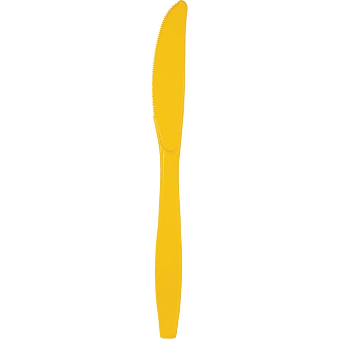 Bright yellow plastic knife with a serrated edge and tapered handle against a white background.