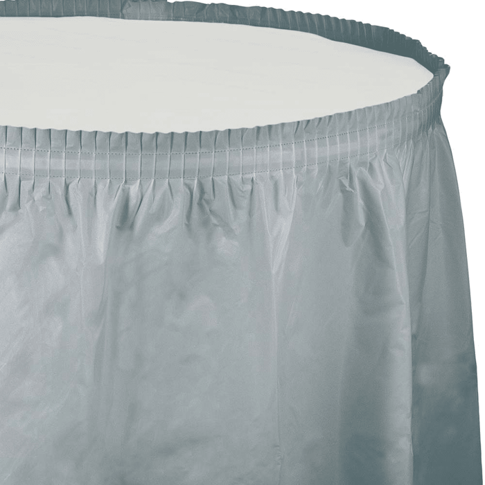 Silver plastic tableskirt with an elastic band top and pleated ruffle design shown against a white background.