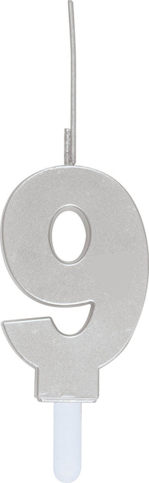 Silver metallic number 9 birthday candle with a white holder stick, featuring a sparkly textured finish.