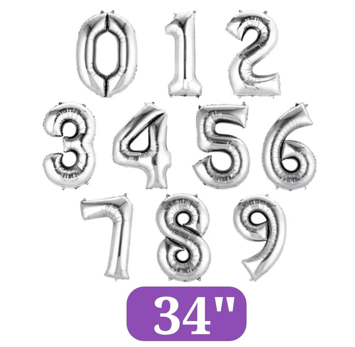 Silver foil balloons displaying digits 0 through 9 in large 34-inch size, arranged in three rows with a purple label at the bottom.