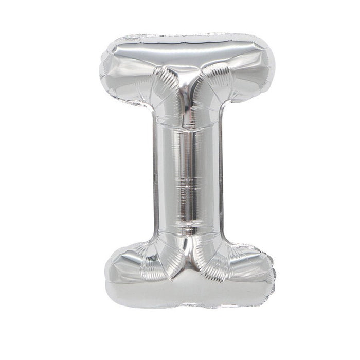 Silver mylar letter balloon shaped like the letter J with a reflective finish and flat base for standing upright.