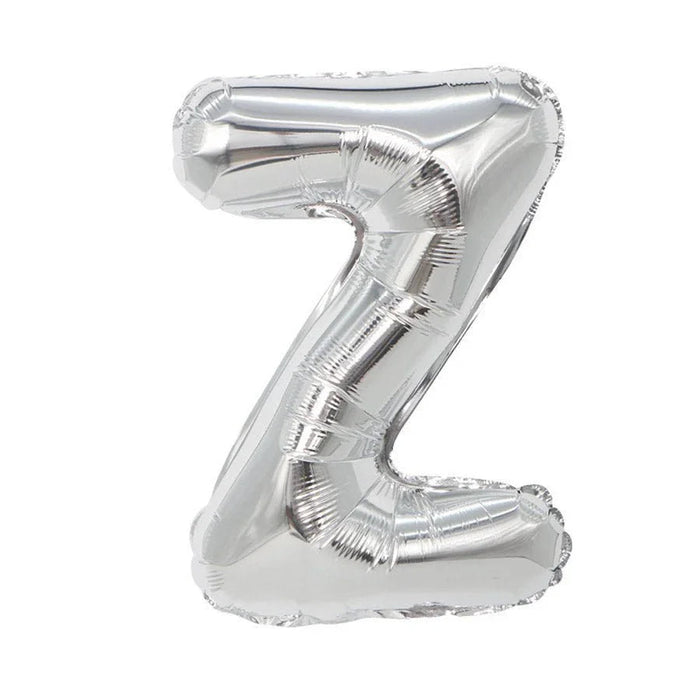 Silver metallic mylar letter balloon shaped like the number 7, inflated and photographed against a white background.