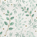 White paper napkins featuring green leafy botanical branches and small gold dots scattered throughout in a delicate repeating pattern.