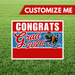 Graduation-themed customizable sign with 'Congrats Grad 2026' on a grass background