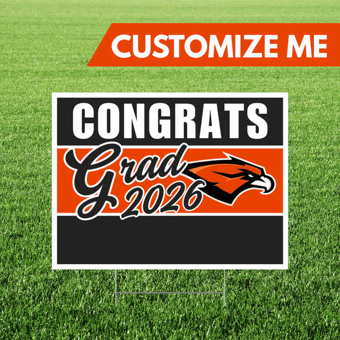 Graduation-themed sign with 'Congrats Grad 2026' on a grass background