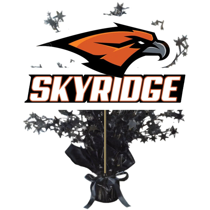 Skyridge High School centerpiece spray featuring an orange and black eagle head logo above the text "SKYRIDGE," with black star bursts erupting from a black wrapped base tied with a ribbon.