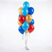 Bright balloon bouquet featuring bright blue, royal blue, red, and metallic gold latex balloons gathered with coordinating curling ribbons and tied to a balloon weight.
