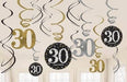 Gold and black "30" swirl decorations with hanging ribbons in cream, gold, and silver tones against a light background, containing twelve hanging pieces for birthday celebrations.