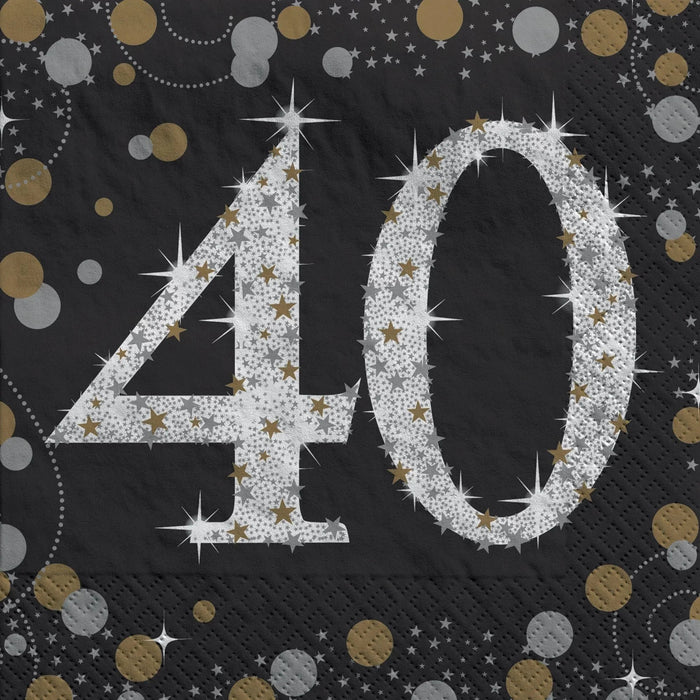 Sparkling silver and gold "40" numbers on black napkins with decorative stars, circles, and dotted patterns throughout the design.