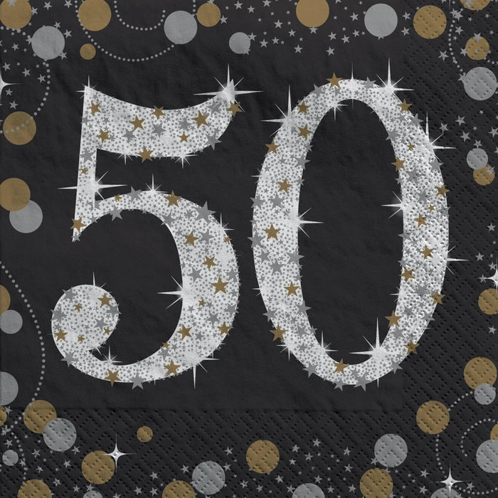 Black cocktail napkins featuring a large sparkling silver "50" with gold and silver stars, surrounded by decorative gold and silver circles and dotted garland patterns.