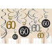 Gold, black, and silver hanging swirl decorations with numbers 60 in various sizes and colors arranged against a cream background.