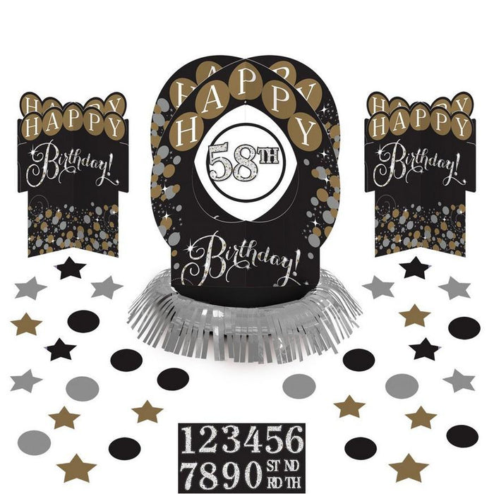 Fifty-one piece 58th birthday decoration set in black, gold, and silver featuring a centerpiece with silver fringe, two banner signs, and scattered stars and circles in various sizes and colors.