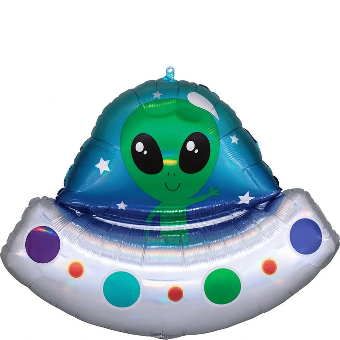 Inflatable mylar balloon shaped like a friendly green alien face inside a silver UFO with a blue starry top, colorful circles on the base, and a hanging loop.
