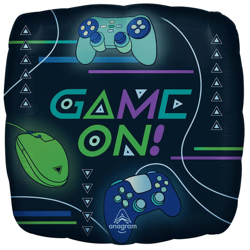 Bright square mylar balloon featuring "Game On" text in green and purple letters, with illustrations of gaming controllers and a green computer mouse on a dark background.