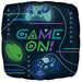 Bright square mylar balloon featuring "Game On" text in green and purple letters, with illustrations of gaming controllers and a green computer mouse on a dark background.