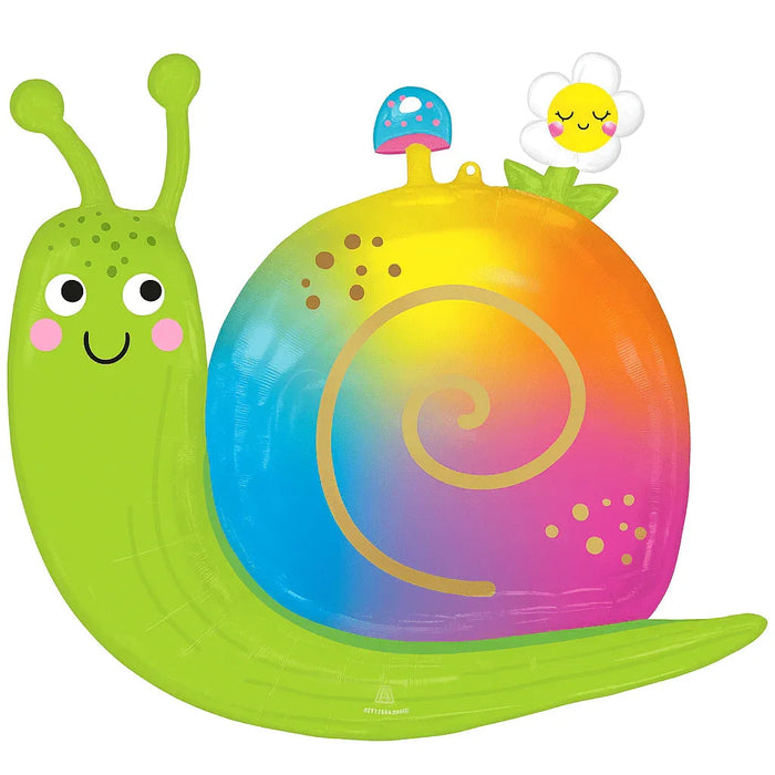 Colorful mylar balloon shaped like a smiling snail with a bright green body and head with antenna, rainbow gradient shell in blue, yellow, orange, and pink, and a cheerful daisy flower decoration on top.