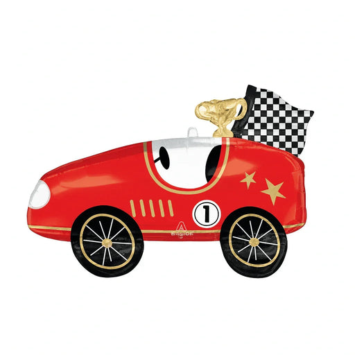 Red race car-shaped foil balloon with gold trim, number 1 emblem, black wheels with gold spokes, gold trophy on roof, and checkered flag, 31 by 20 inches.