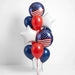 Vertical arrangement of red, white, and navy balloons with two American flag-patterned foil balloons and star-shaped accents.