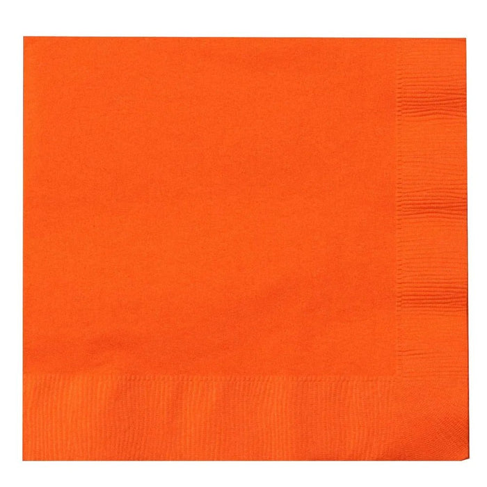 Sunkissed orange paper napkins with visible texture and fold lines on the edges.