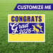 Graduation-themed customizable sign with 'Congrats Grad 2026' text on a grass background