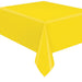 Sunshine yellow plastic tablecover draped over a rectangular table with a solid bright yellow finish.