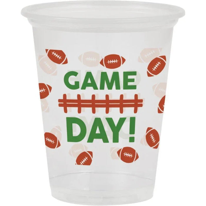 Clear plastic 16-ounce cups printed with "Game Day" in green text, a red football field design, and brown and tan footballs scattered across the surface.