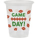 Clear plastic 16-ounce cups printed with "Game Day" in green text, a red football field design, and brown and tan footballs scattered across the surface.