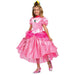 Child wearing a pink Princess Peach costume with a puffed short-sleeve top, layered tulle skirt, gold crown with jewels, red choker, and pink shoes.