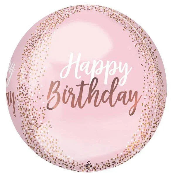 Pink oval foil balloon with "Happy Birthday" text in white and rose gold script, decorated with rose gold confetti dots around the edges.
