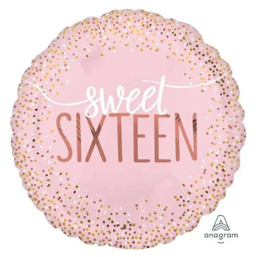 Round pink foil balloon with gold and rose gold confetti pattern and white script text reading "sweet SIXTEEN".
