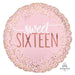 Round pink foil balloon with gold and rose gold confetti pattern and white script text reading "sweet SIXTEEN".