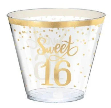 Clear plastic cup with gold "Sweet 16" text and gold confetti pattern around the rim and body.