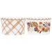 Two decorative paper treat cups with scalloped tops in tan and cream, one featuring a diamond lattice pattern and the other displaying autumn flowers and leaves.